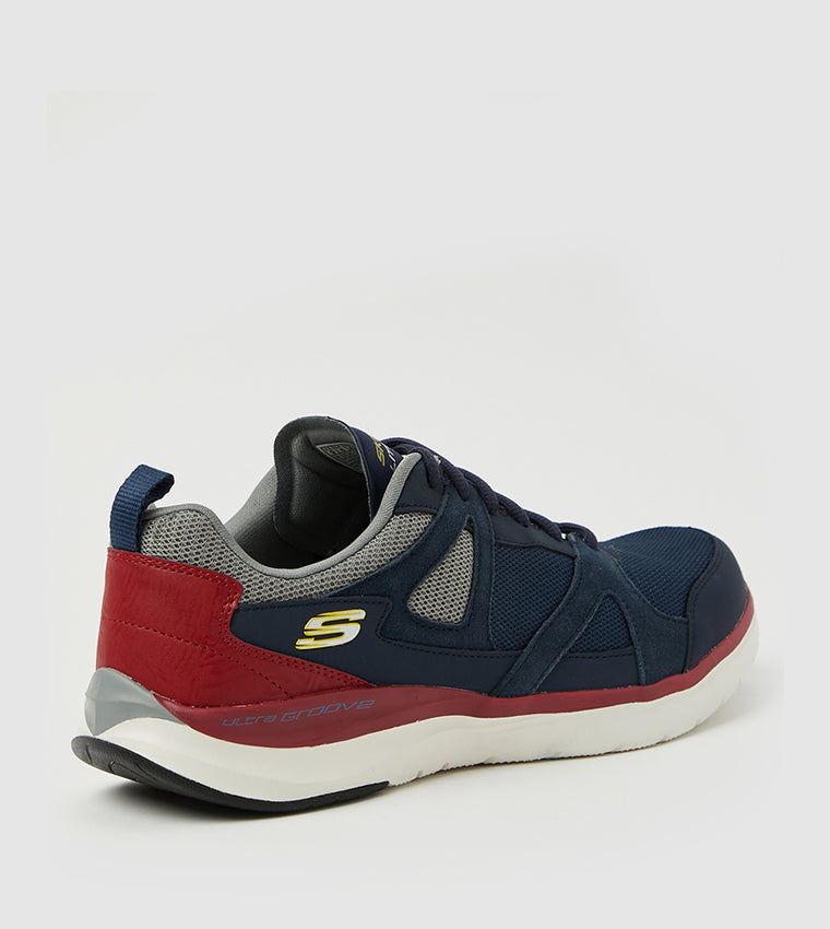 حذاء Skechers Ultra Groove Sports Lifestyle للرجال، أزرق داكن وبيج